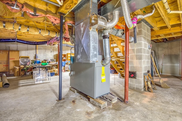 basement featuring heating unit