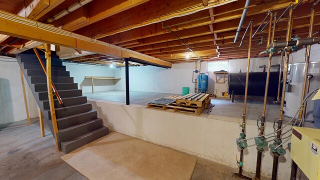 basement featuring water heater