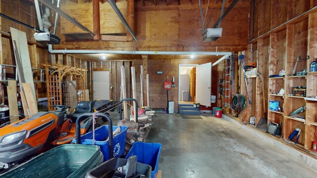 garage featuring a garage door opener