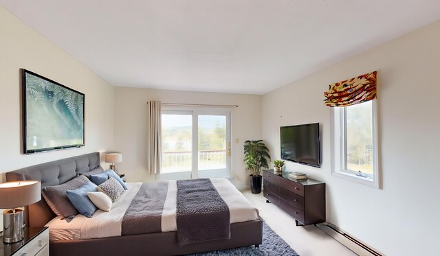 bedroom with light colored carpet, access to exterior, and baseboard heating