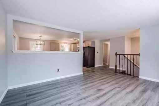 unfurnished living room featuring hardwood / wood-style floors