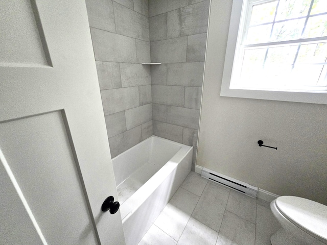 bathroom featuring a baseboard heating unit, tile patterned floors, toilet, and baseboards