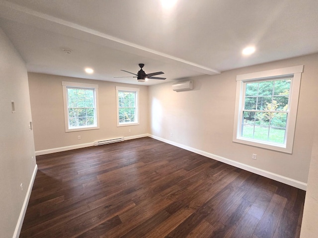 spare room with dark wood-style floors, baseboards, a wall mounted air conditioner, and baseboard heating