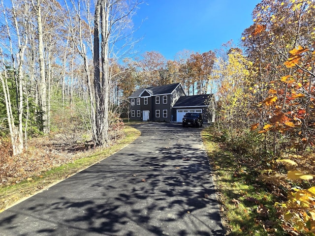 view of front facade with an attached garage and driveway