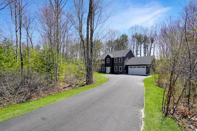 12 Country Dr, Old Orchard Beach, ME 04064 - view of front of property featuring driveway, an attached garage, and a shingled roof