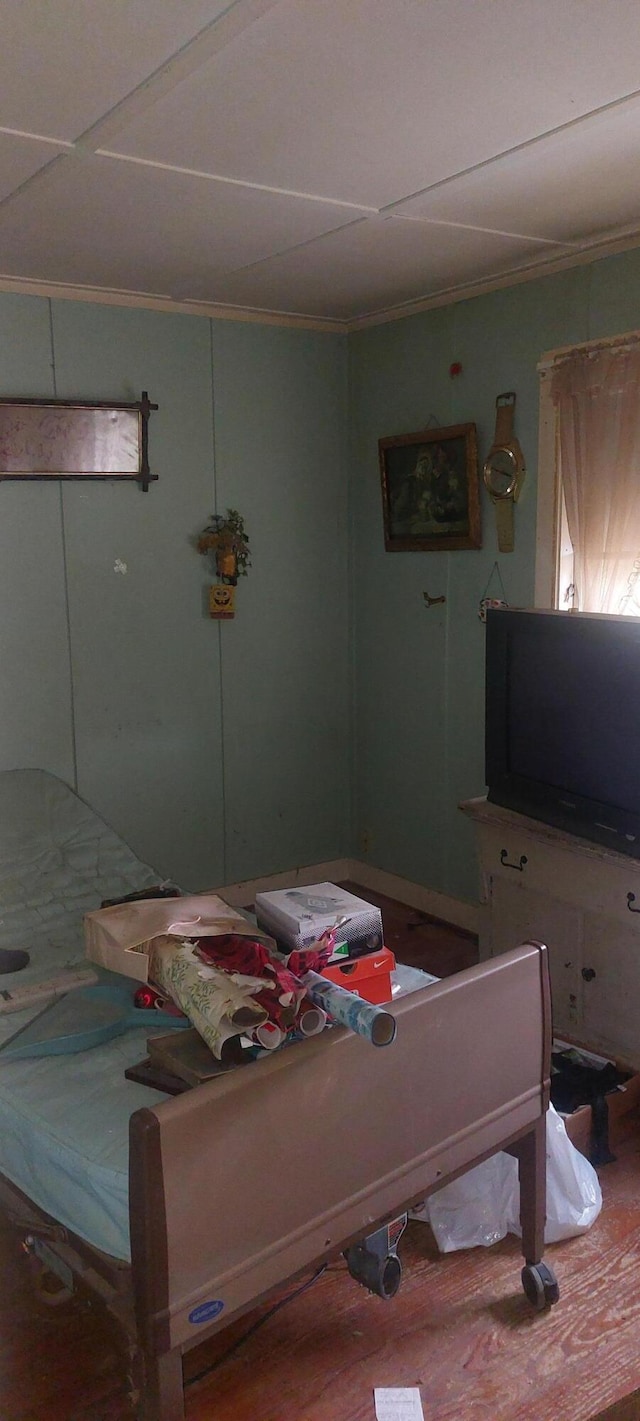 bedroom with crown molding