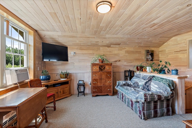 sitting room with wood ceiling, light colored carpet, and vaulted ceiling