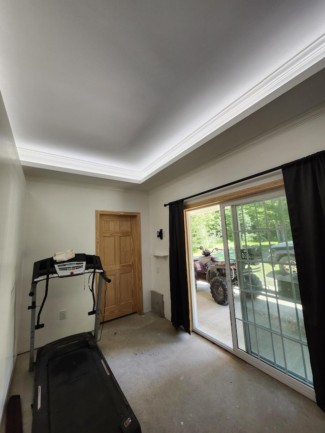 exercise room featuring ornamental molding