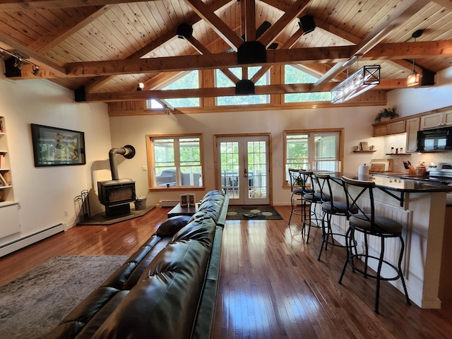 living room featuring wooden ceiling, a wood stove, french doors, high vaulted ceiling, and beam ceiling