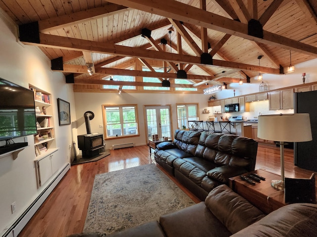 living room featuring high vaulted ceiling, baseboard heating, beamed ceiling, and a wood stove