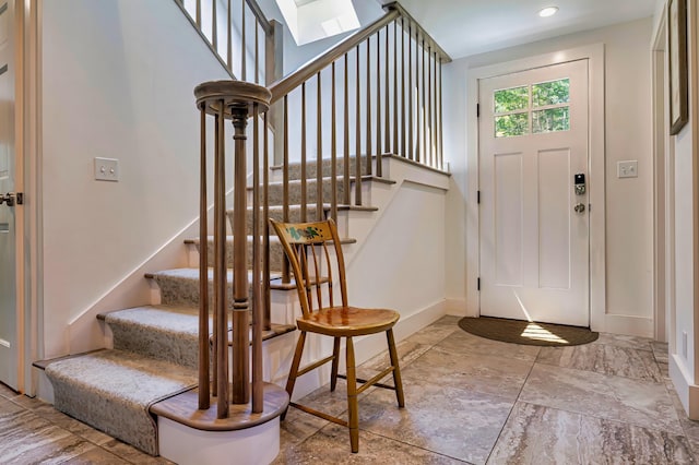 226 Graytown Rd, Sedgwick, ME 04676 - foyer entrance featuring baseboards and stairs