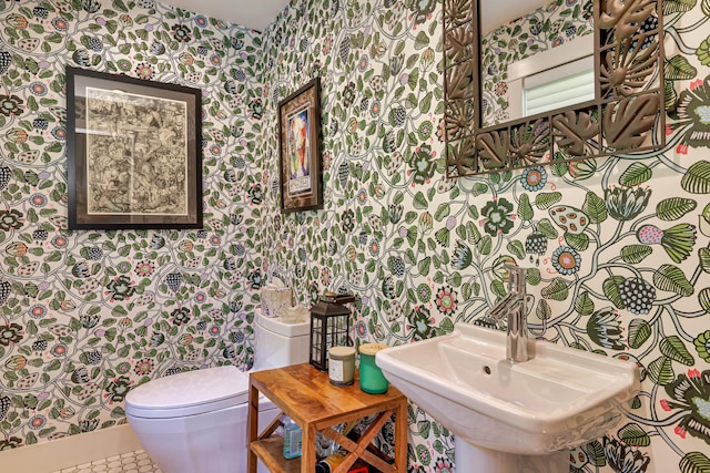 226 Graytown Rd, Sedgwick, ME 04676 - bathroom featuring a sink, wallpapered walls, and toilet