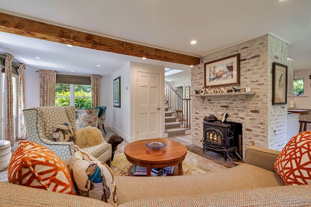 226 Graytown Rd, Sedgwick, ME 04676 - living room with stairway, a wood stove, recessed lighting, baseboards, and beam ceiling