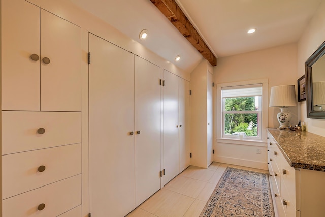 226 Graytown Rd, Sedgwick, ME 04676 - kitchen featuring recessed lighting, light tile patterned floors, baseboards, dark stone counters, and vaulted ceiling with beams
