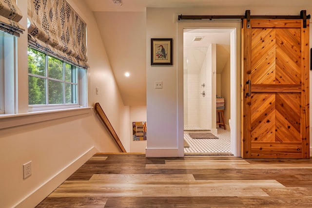 226 Graytown Rd, Sedgwick, ME 04676 - interior space featuring baseboards, visible vents, an upstairs landing, and wood finished floors
