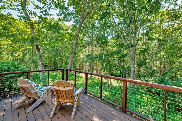 226 Graytown Rd, Sedgwick, ME 04676 - wooden deck with a view of trees