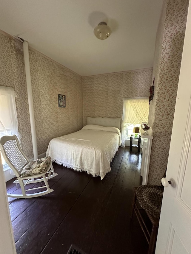 bedroom featuring wood-type flooring