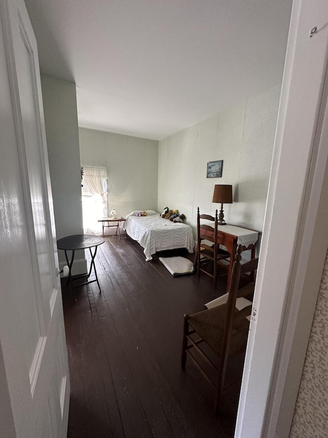 bedroom featuring dark hardwood / wood-style floors