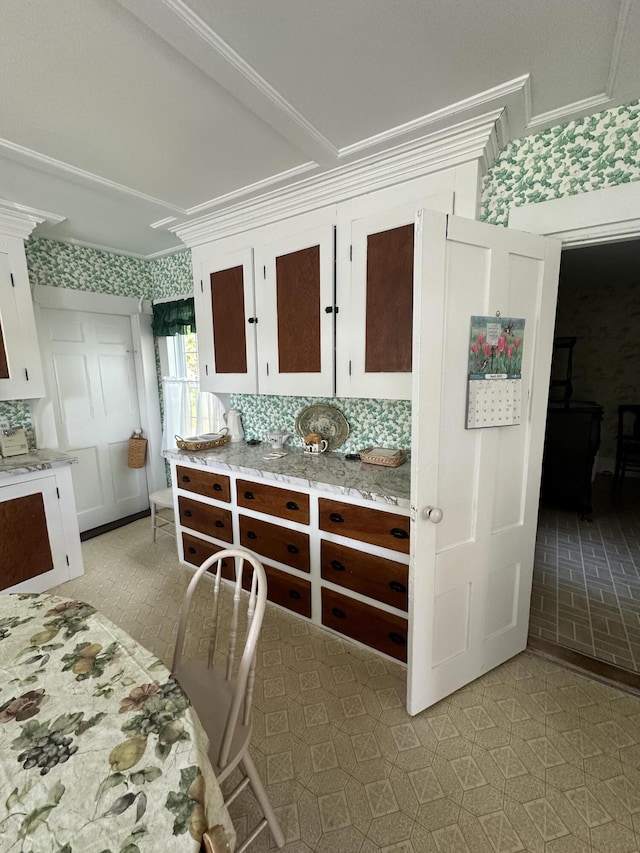 bedroom with ornamental molding