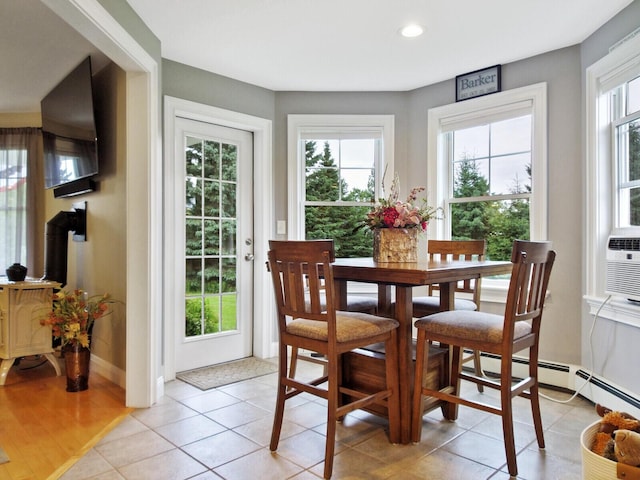 tiled dining space with a wealth of natural light