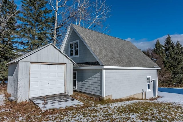 view of snow covered garage