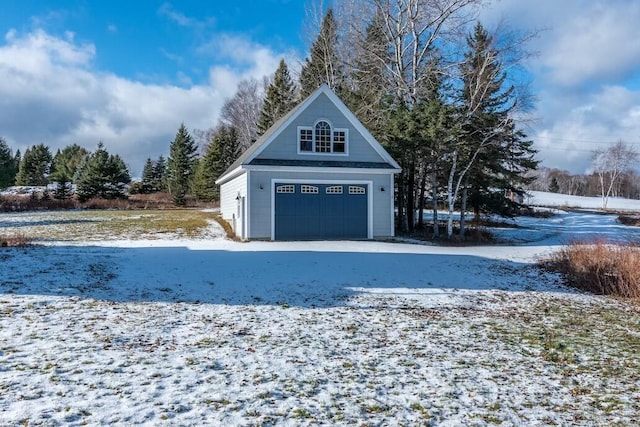 view of snow covered garage