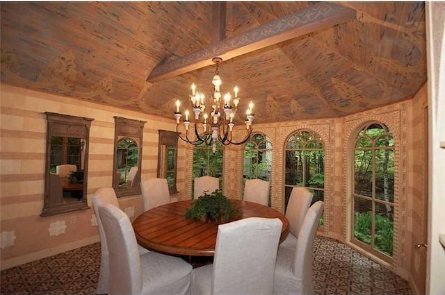 dining room with an inviting chandelier, beam ceiling, and high vaulted ceiling