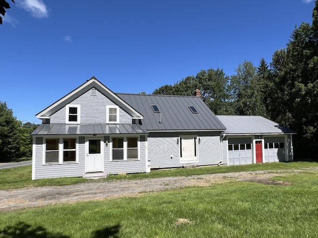 view of front facade with a front lawn and a garage