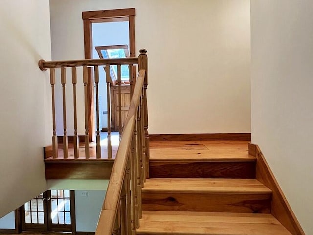 stairway featuring french doors