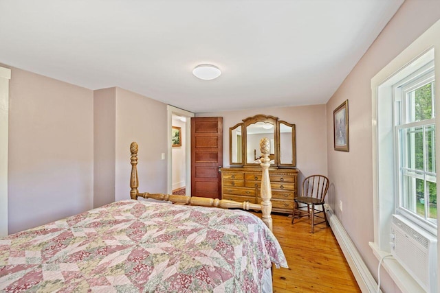 bedroom featuring hardwood / wood-style flooring