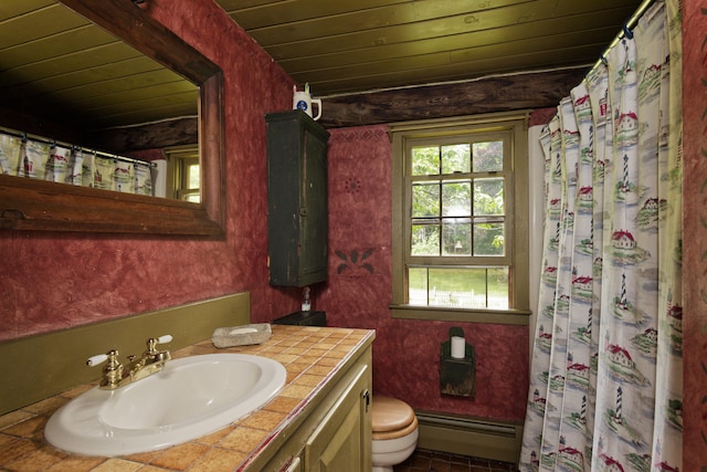 bathroom with vanity, toilet, a baseboard heating unit, and wood ceiling