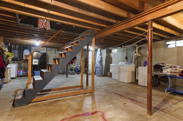 basement with washing machine and clothes dryer