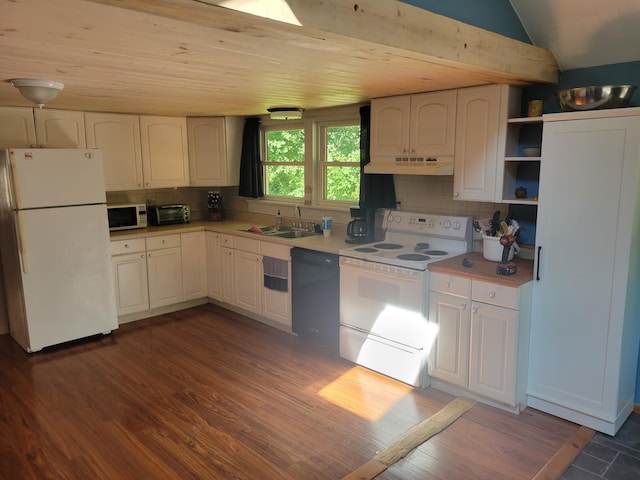 kitchen with sink, white appliances, white cabinets, and tasteful backsplash