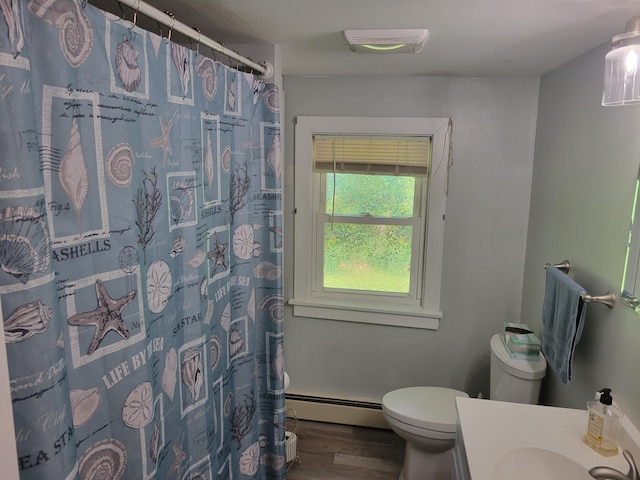 bathroom featuring toilet, vanity, hardwood / wood-style flooring, a baseboard radiator, and curtained shower