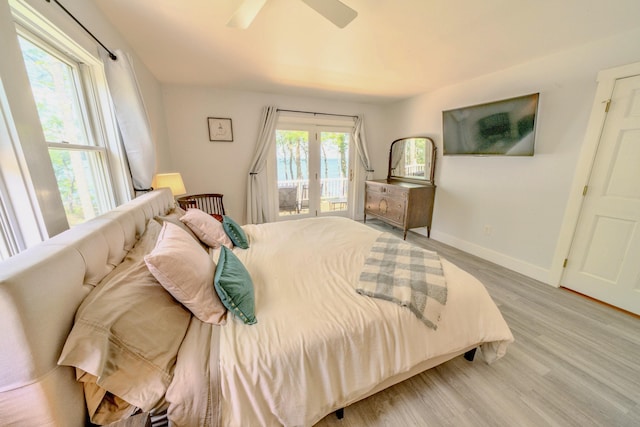 bedroom featuring ceiling fan and light hardwood / wood-style flooring