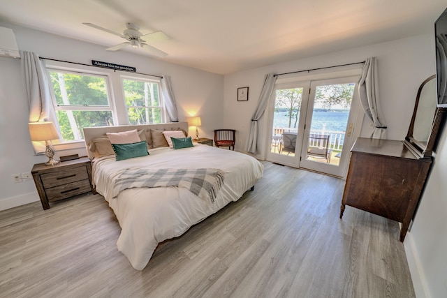 bedroom featuring ceiling fan, access to outside, and light wood-type flooring