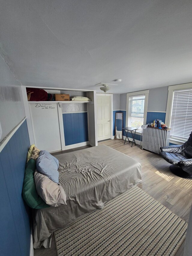 bedroom with wood-type flooring