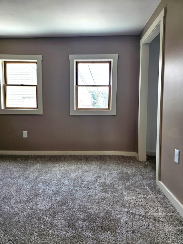 view of carpeted spare room