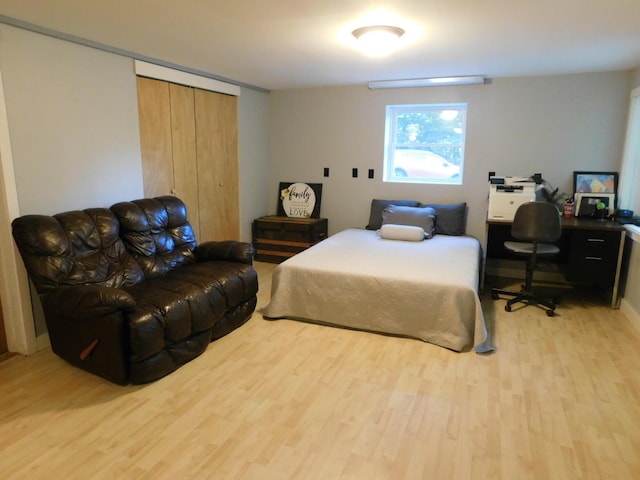 bedroom with light hardwood / wood-style flooring