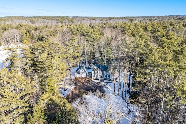 drone / aerial view featuring a view of trees