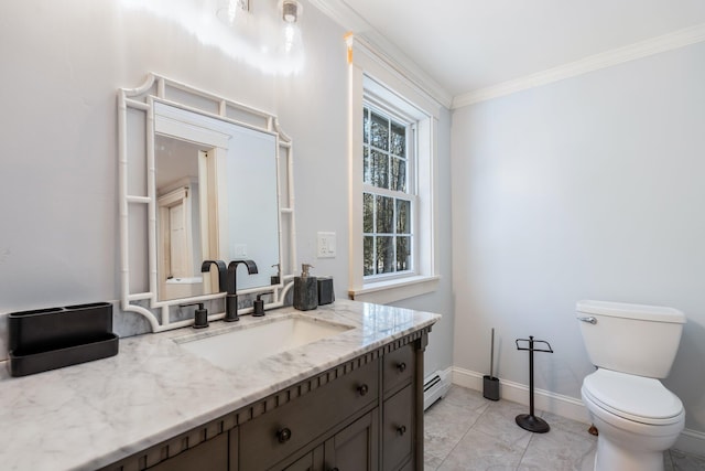 bathroom with baseboards, toilet, ornamental molding, baseboard heating, and vanity