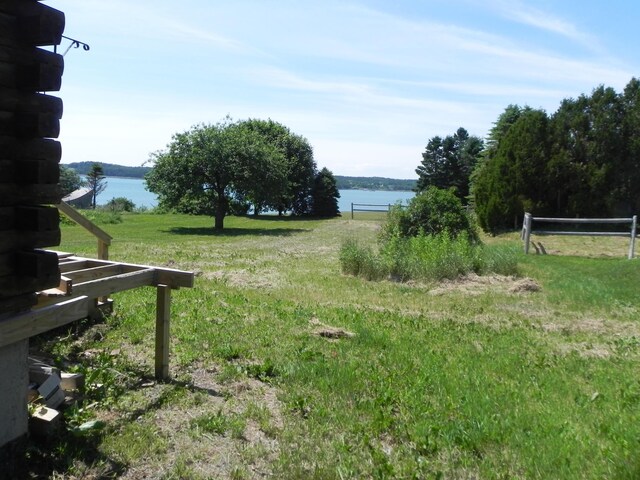 view of yard with a water view