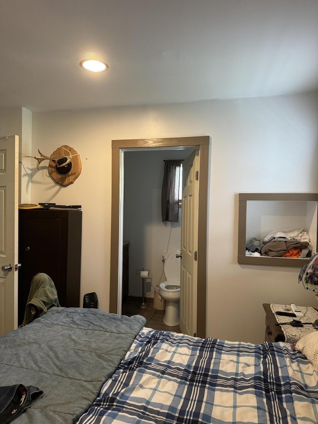 bedroom featuring ensuite bathroom