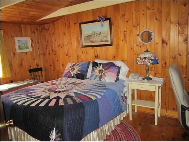 78 Clarks Cove Rd, South Bristol, ME 04573 - bedroom with wood ceiling, wood walls, and wood finished floors