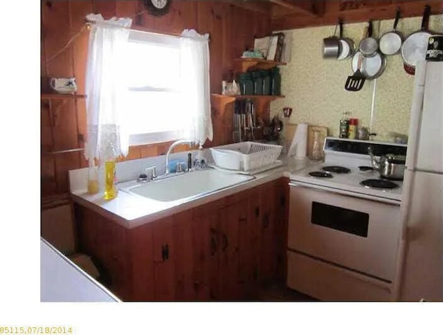 78 Clarks Cove Rd, South Bristol, ME 04573 - kitchen featuring white appliances, a sink, and light countertops