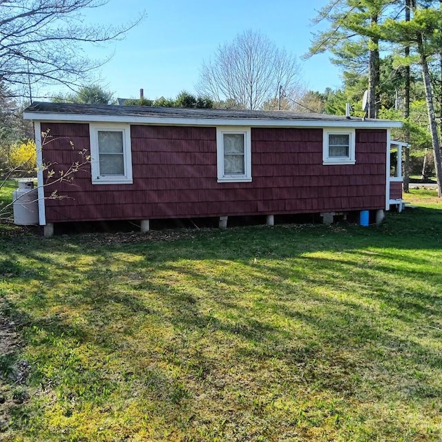 78 Clarks Cove Rd, South Bristol, ME 04573 - view of side of property featuring a yard