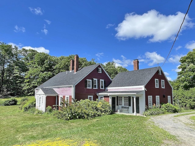 view of front facade with a garage and a front yard