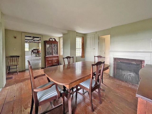 dining space featuring dark wood-type flooring