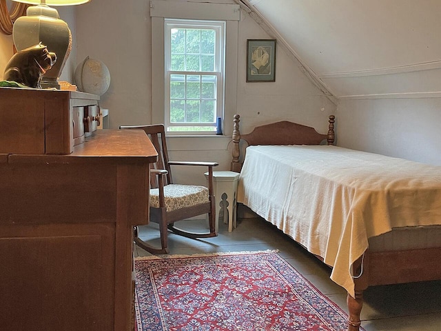 tiled bedroom with vaulted ceiling