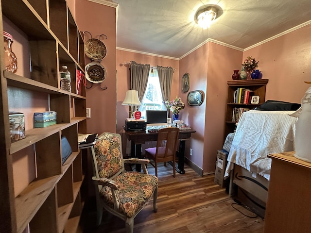 bedroom with hardwood / wood-style flooring and ornamental molding